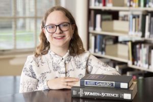 Megan Krempa with books