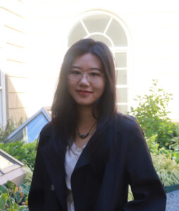 pic of Nerissa Zhang with Wilwerth Garden behind in sunshine